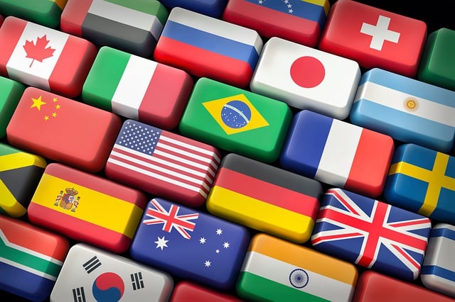 flagi na przyciskach klawiatury - różne języki tłumaczeń przysięgłych